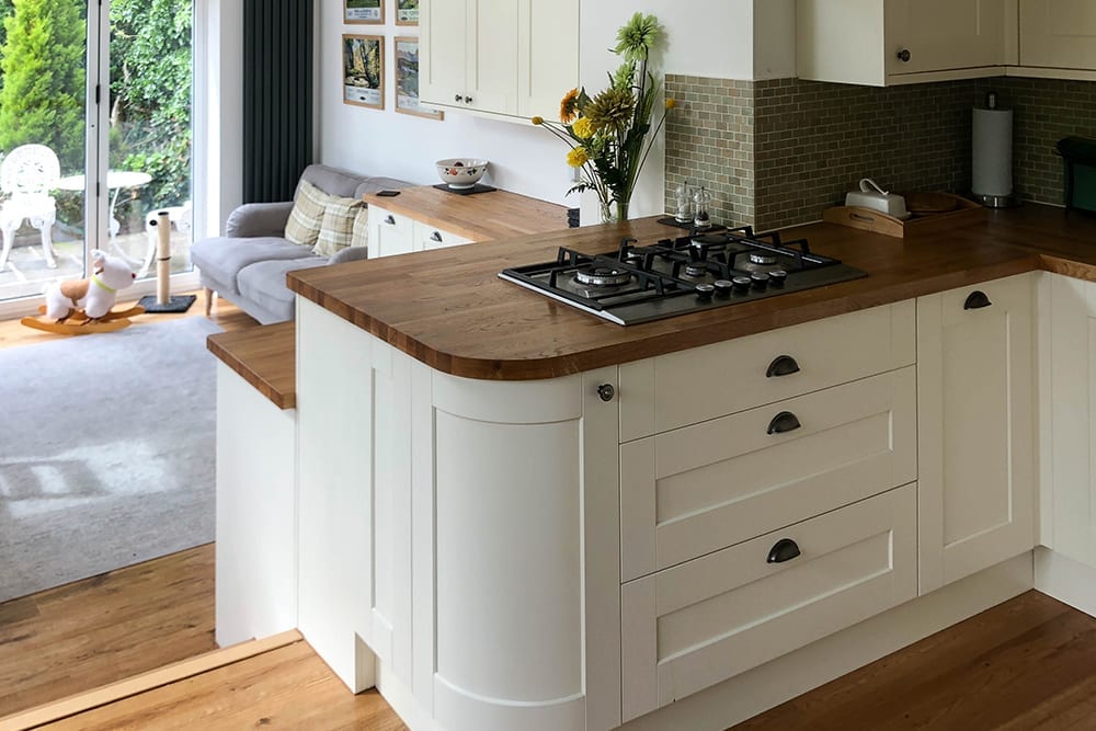 modern kitchen with curved cabinets