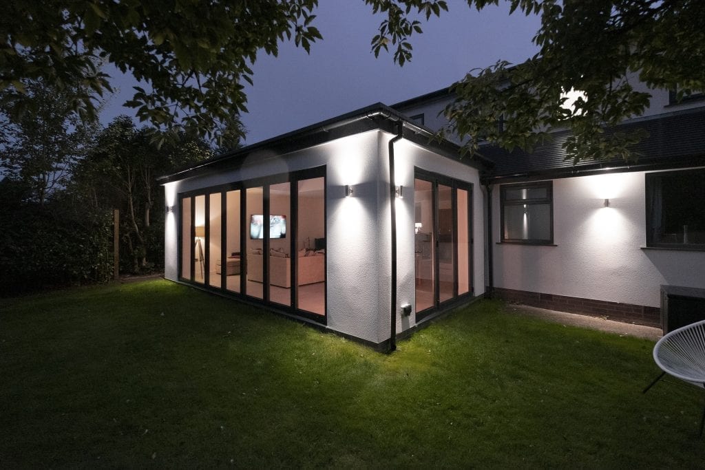 kitchen extension with bi folds at night