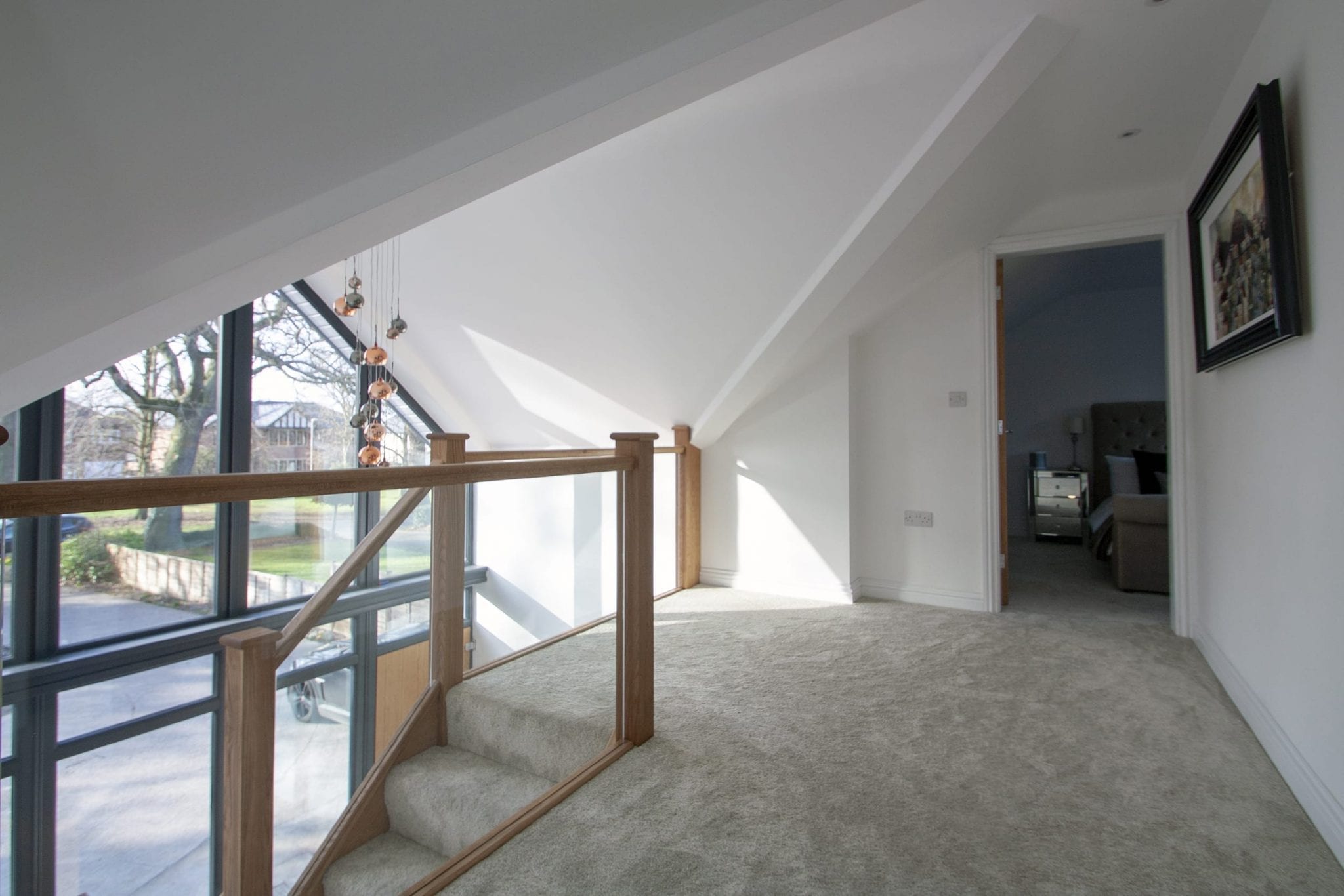 modern staircase with oak and glass