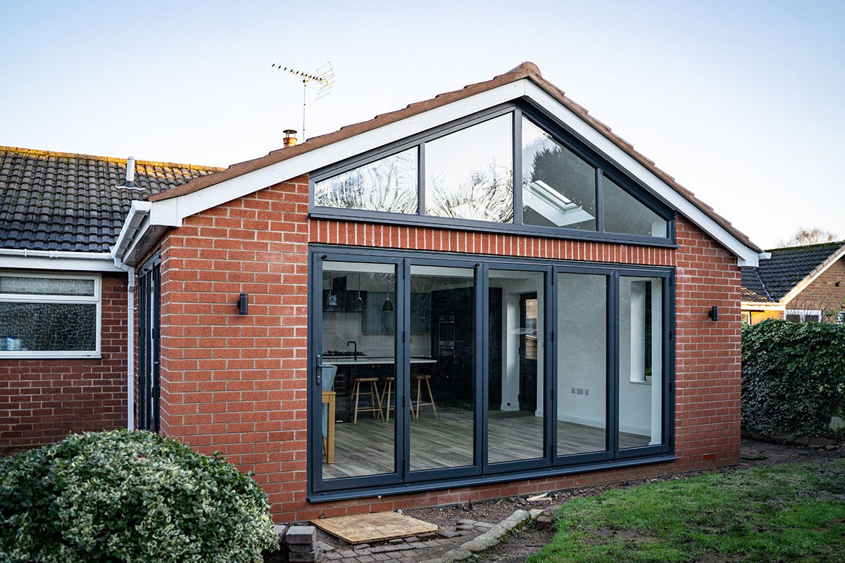 open plan kitchen extension exterior with bi fold doors